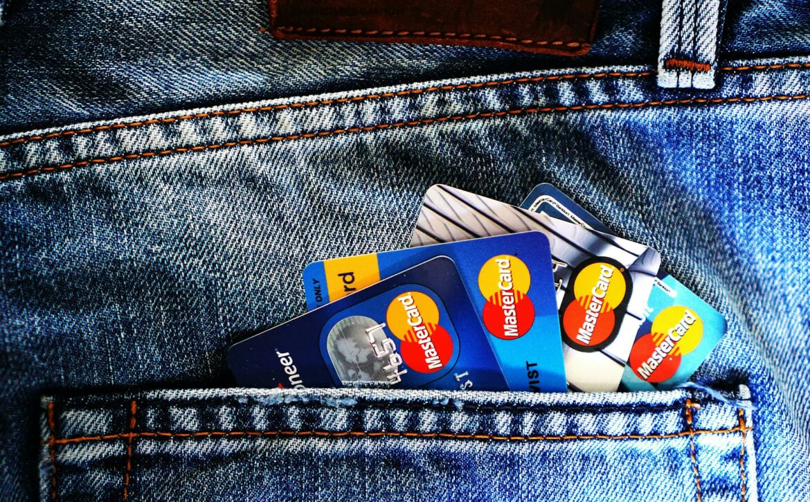 blue master card on denim pocket