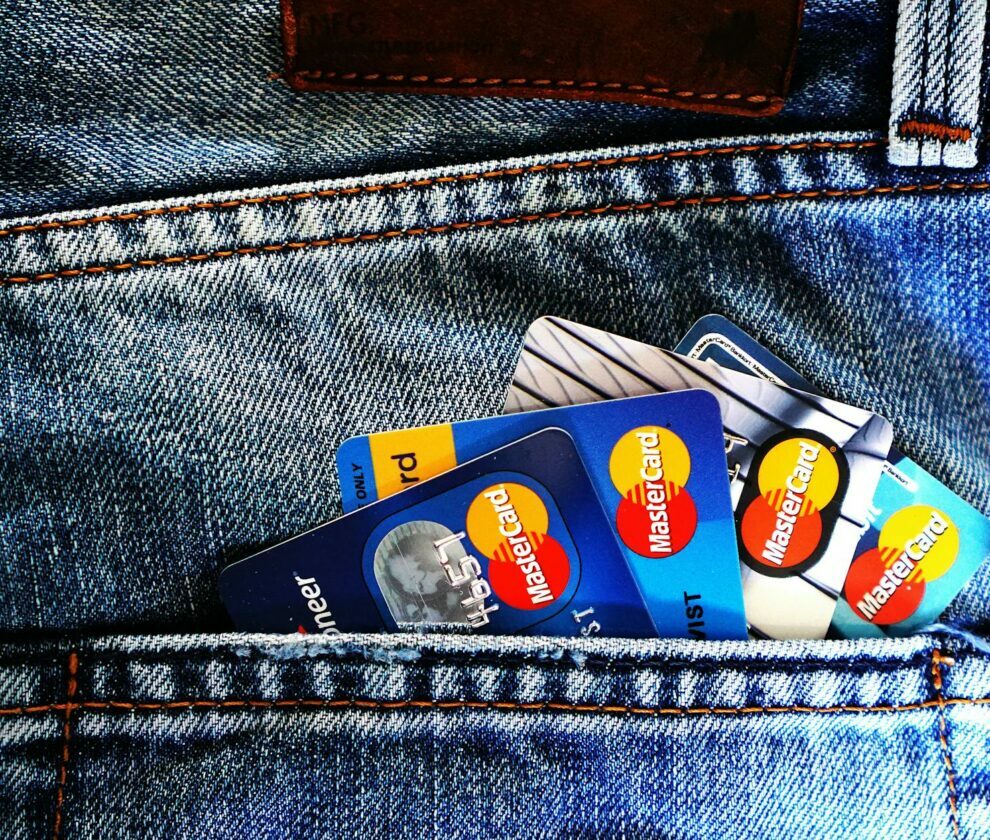 blue master card on denim pocket